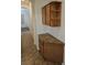 Hallway view showcasing custom cabinets and granite countertop detail, adding style and function at 3615 Hardwick Hall Way, Las Vegas, NV 89135
