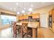 Spacious kitchen with island bar seating, ample counter space, and an adjacent breakfast nook at 3615 Hardwick Hall Way, Las Vegas, NV 89135