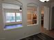 Open-concept view showcasing the living room, backyard pool, dining area, and kitchen at 3615 Hardwick Hall Way, Las Vegas, NV 89135