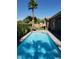 Private pool area with sparkling water and a poolside lounge chair, perfect for enjoying sunny days at 3615 Hardwick Hall Way, Las Vegas, NV 89135