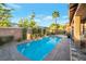 Refreshing backyard swimming pool surrounded by pavers and mature landscaping, perfect for relaxation at 3615 Hardwick Hall Way, Las Vegas, NV 89135