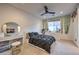 Stylish bedroom with modern decor, decorative wall hangings, and ceiling fan at 3731 Caesars Cir, Las Vegas, NV 89120