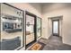 Modern entryway features tile floors, a large picture window, and glass front door at 3731 Caesars Cir, Las Vegas, NV 89120