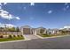 Beautiful single-story home featuring a three-car garage, desert landscaping, and a modern design at 3731 Caesars Cir, Las Vegas, NV 89120