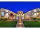 This property is enhanced with a beautiful yard, a stone walkway, and manicured landscaping at 3731 Caesars Cir, Las Vegas, NV 89120