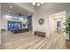 Spacious living room with high ceilings, an electric fireplace, and sliding glass doors at 3731 Caesars Cir, Las Vegas, NV 89120