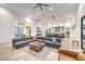 Bright living room with wood floors and high ceilings is part of an open concept design at 3731 Caesars Cir, Las Vegas, NV 89120