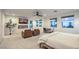 Bright main bedroom with modern fireplace, television, sitting area, and a serene atmosphere at 3731 Caesars Cir, Las Vegas, NV 89120