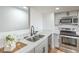 Updated kitchen featuring modern appliances, countertops, and fixtures at 3790 Shirebrook Dr # 167, Las Vegas, NV 89115