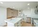 Bright kitchen with island seating, stainless steel appliances and updated fixtures at 3790 Shirebrook Dr # 167, Las Vegas, NV 89115