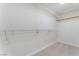 Walk-in closet with simple wire shelving, perfect for easy organization and storage at 4740 Killington St, Las Vegas, NV 89129
