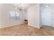 Dining room featuring elegant light fixture and tile floors at 4740 Killington St, Las Vegas, NV 89129