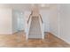 Bright foyer featuring tile flooring, staircase and white walls at 4740 Killington St, Las Vegas, NV 89129