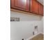 Laundry room with hookups and storage cabinets for organizing your essentials at 4740 Killington St, Las Vegas, NV 89129
