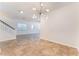 Spacious living room area with tile flooring and natural light at 4740 Killington St, Las Vegas, NV 89129