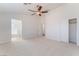 Large main bedroom with neutral carpet and ensuite bathroom at 4740 Killington St, Las Vegas, NV 89129