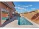 Inviting backyard with a refreshing pool, surrounded by a low-maintenance desert landscape at 4740 Killington St, Las Vegas, NV 89129