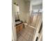 Bathroom featuring a tiled shower and vanity, maximizing space and function at 5214 Monterey Park Cir, Las Vegas, NV 89146