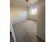 A carpeted bedroom providing a cozy retreat for rest and relaxation at 5214 Monterey Park Cir, Las Vegas, NV 89146