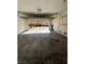Two car garage with an automatic door that leads into a driveway at 5214 Monterey Park Cir, Las Vegas, NV 89146