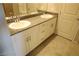 Bathroom featuring dual sinks, granite countertop, white cabinetry, and tile flooring at 5269 Acadia Leaf St, Las Vegas, NV 89166
