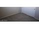 Carpeted bedroom with neutral-colored walls and a closet featuring sliding doors at 5269 Acadia Leaf St, Las Vegas, NV 89166