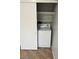 Practical laundry closet featuring a standard washing machine and overhead storage at 579 Roxella Ln # D, Las Vegas, NV 89110