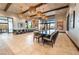 Spacious dining area with large windows and stylish pendant lighting at 6801 Steel Mist St, Las Vegas, NV 89148