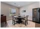 Formal dining room with modern decor and a wine cooler at 6801 Steel Mist St, Las Vegas, NV 89148