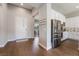 Welcoming entryway featuring hardwood floors and direct access to the kitchen at 6801 Steel Mist St, Las Vegas, NV 89148