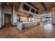 Large kitchen area with stainless steel appliances and dining area in clubhouse at 6801 Steel Mist St, Las Vegas, NV 89148