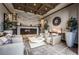 Inviting living room with a fireplace, stylish furniture, and decorative accents at 6801 Steel Mist St, Las Vegas, NV 89148