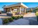 Outdoor kitchen area with seating, perfect for entertaining guests and enjoying the fresh air at 6801 Steel Mist St, Las Vegas, NV 89148