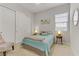 Comfortable bedroom featuring a neutral color scheme and ample closet space at 8729 Marcana St, Las Vegas, NV 89166