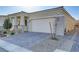 Charming single-story home featuring a stylish paver driveway and a two-car garage at 8729 Marcana St, Las Vegas, NV 89166