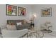 Stylish living room features neutral tones, tasteful decor, and comfortable seating at 8729 Marcana St, Las Vegas, NV 89166