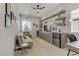 Cozy living room boasts custom built-ins, stylish decor, and ample natural light at 8729 Marcana St, Las Vegas, NV 89166