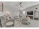 Comfortable and well-lit living room featuring stylish furnishings and modern decor elements at 8729 Marcana St, Las Vegas, NV 89166