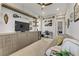 Comfortable living room featuring built-in cabinetry, floating shelves, and ample space at 8729 Marcana St, Las Vegas, NV 89166