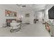 Bright, open living space boasting modern decor and seamless transitions throughout the home at 8729 Marcana St, Las Vegas, NV 89166