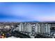 Stunning aerial view of luxury high-rise condos against a vibrant Las Vegas skyline at 9103 Alta Dr # 1502, Las Vegas, NV 89145