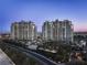Stunning aerial view of two high-rise condo towers, showcasing lush landscaping and elegant entrance at 9103 Alta Dr # 1502, Las Vegas, NV 89145