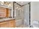 Elegant bathroom featuring a glass-enclosed shower, modern vanity, and sophisticated fixtures at 9103 Alta Dr # 1502, Las Vegas, NV 89145