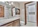 Bathroom features a sleek vanity, modern fixtures, walk in closet, and elegant finishes for a spa-like experience at 9103 Alta Dr # 1502, Las Vegas, NV 89145