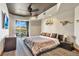 Luxurious bedroom with balcony access, offering stunning views, complemented by custom decor and refined finishes at 9103 Alta Dr # 1502, Las Vegas, NV 89145