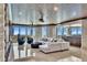 Expansive living room with a decorative ceiling, plush seating, and floor-to-ceiling windows showcasing city views at 9103 Alta Dr # 1502, Las Vegas, NV 89145