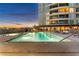 A luxurious swimming pool and hot tub area are steps from the building at 9103 Alta Dr # 1502, Las Vegas, NV 89145