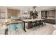 Well-equipped kitchen features a large island with seating, modern appliances, and abundant cabinet space at 9765 Skye Star Ave, Las Vegas, NV 89166