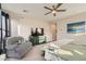 The main bedroom has lots of natural light and a comfy sitting area at 9765 Skye Star Ave, Las Vegas, NV 89166