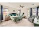 The main bedroom offers natural lighting and neutral carpet at 9765 Skye Star Ave, Las Vegas, NV 89166